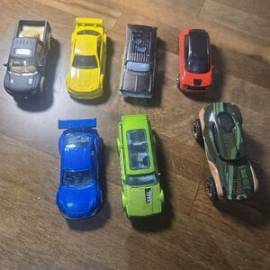 Lot of 7 Matchbox  and Hot wheels Cars